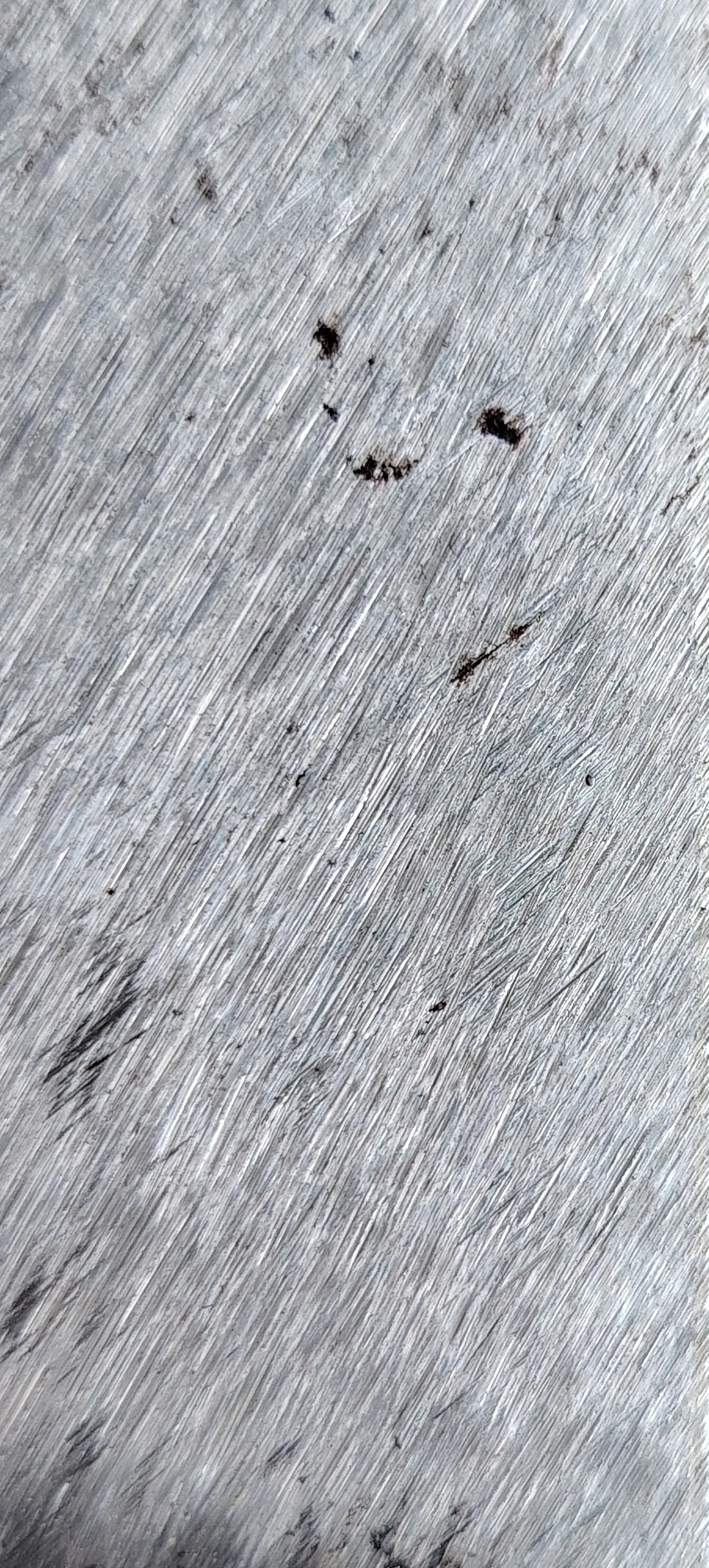 An image of a blade texture from one of our farming tools used as a background image.
